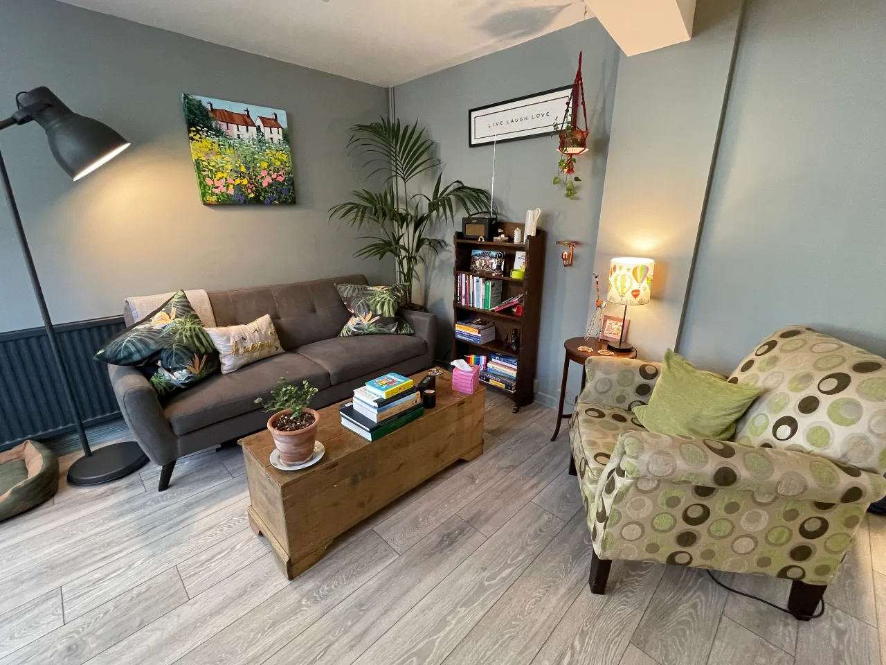 The therapy room at Vermonti Health, Southville, Bristol — a warm, calm space with comfortable seating, plants and natural light
